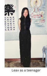 Leav in a black ao dai